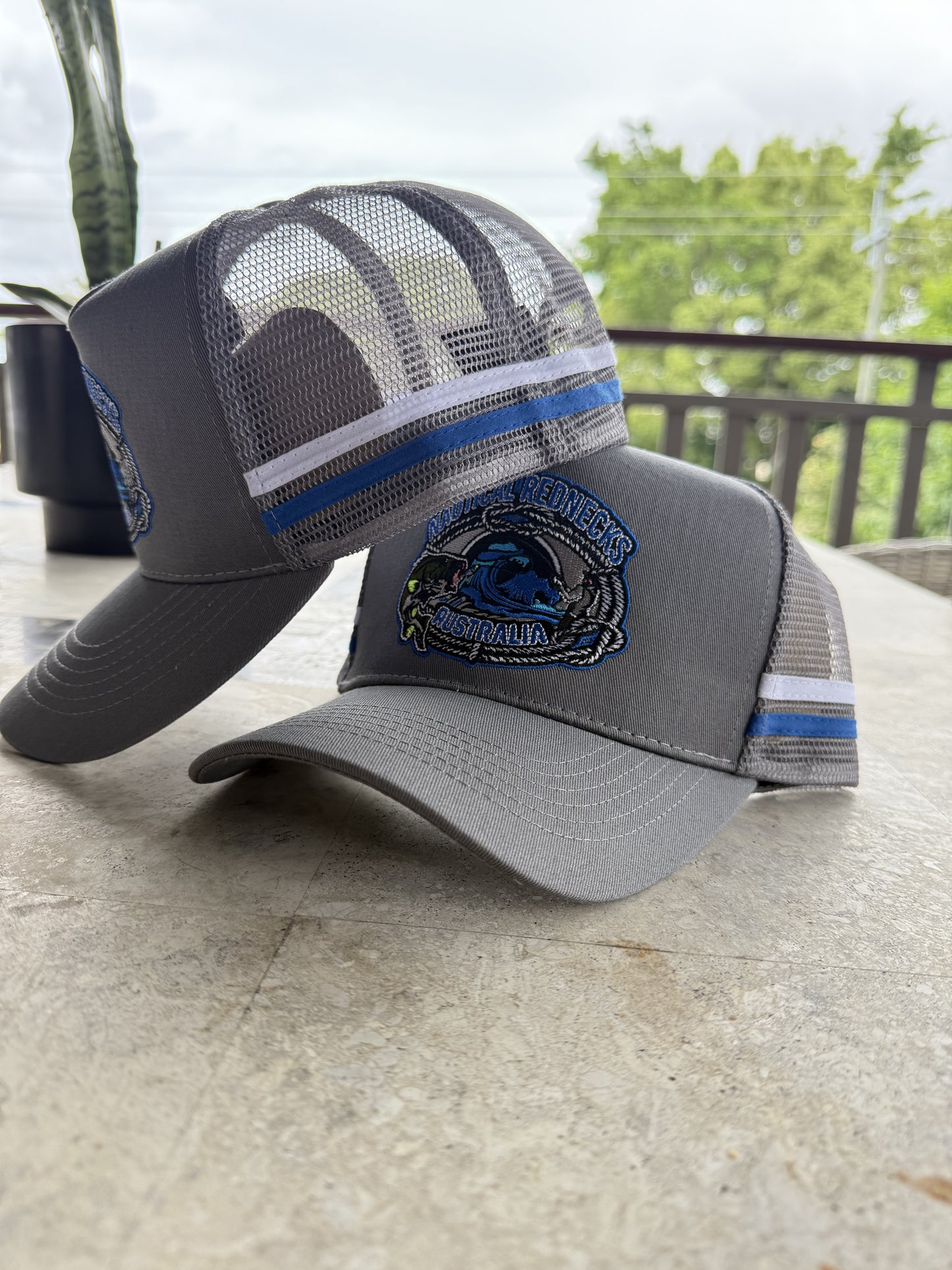 Trucker Cap grey w/ Blue Bass logo