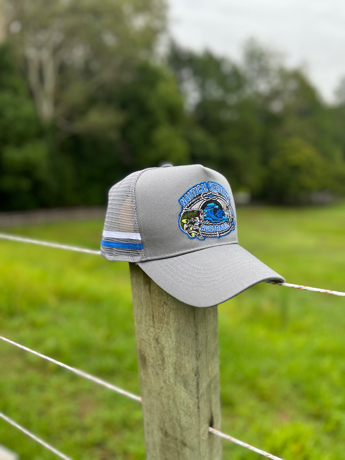 Trucker Cap grey w/ Blue Bass logo